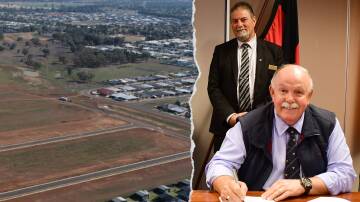 Gus Lico (back) and the RSL club president signed an agreement to exchange the bowling club site for Keswick estate land in 2020. Pictures from file