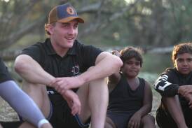 Parkes' Ben Lovett (left) during his travels to regional communities. Picture supplied