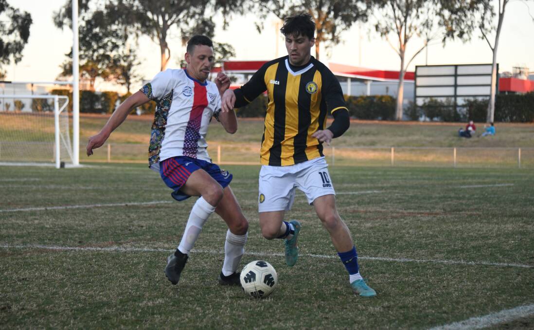 Orana Spurs' Jake Ferguson (left) fights with a Mudgee Wolves player, the latter club won't take part in the 2023 Western Premier League. Picture by Amy McIntyre