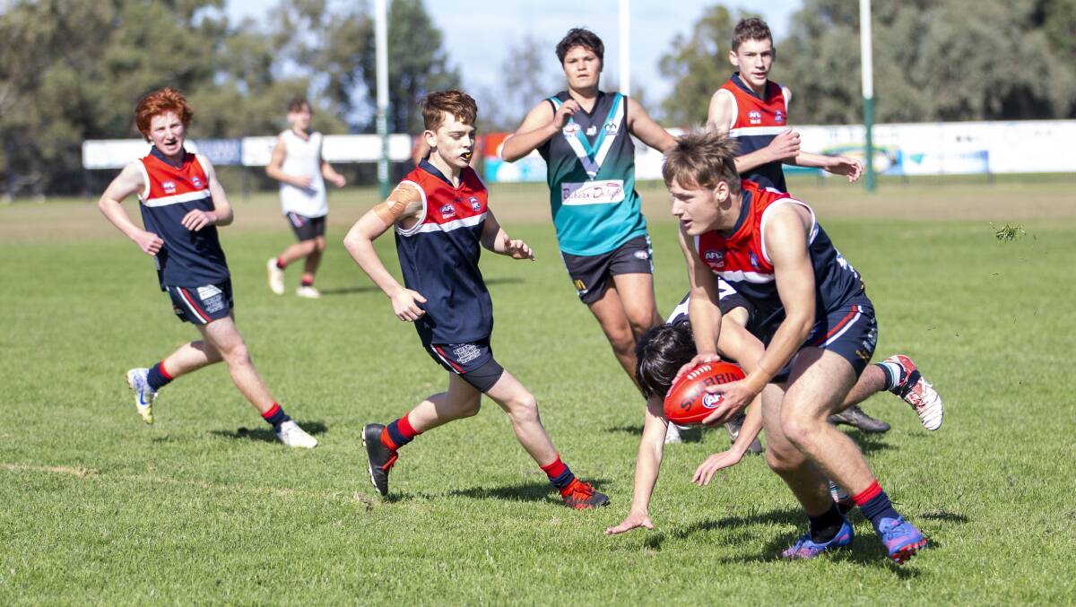 Dubbo Junior AFL's Xander Lakin (with ball) booted five goals on the weekend against the Bathurst Bushrangers. Picture by Katie Havercroft Photography