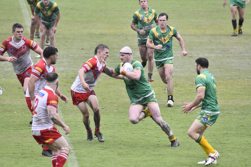 Orange CYMS captain-coach Ethan McKellar on the charge. Picture by Jude Keogh