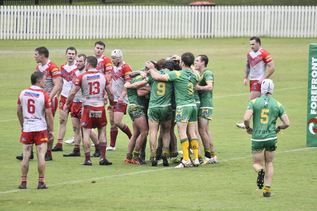 CYMS celebrate a second half try. Picture by Jude Keogh