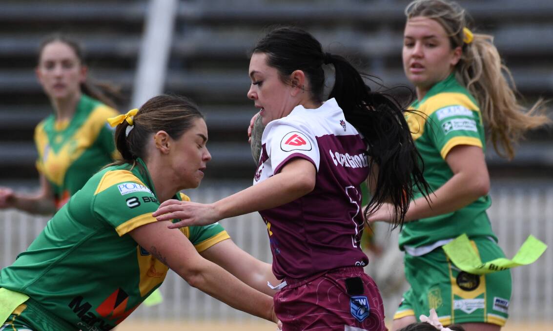 Kiara Sullivan attempts to evade a tag at Wade Park. Picture by Jude Keogh