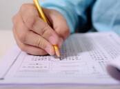 A student takes a multiple choice test like the one used for NAPLAN. Picture via Pixabay
