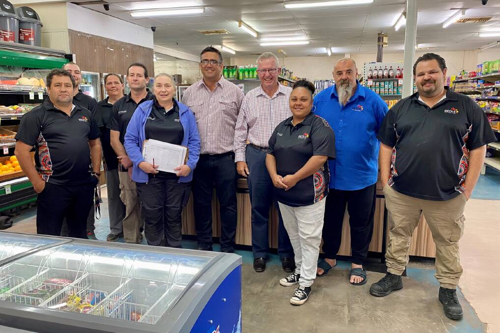 Federal Member for Parkes Mark Coulton pictured REDI.E Deputy CEO Michael Cooper (fifth from left) and the staff at the Wilcannia General Store. Picture supplied