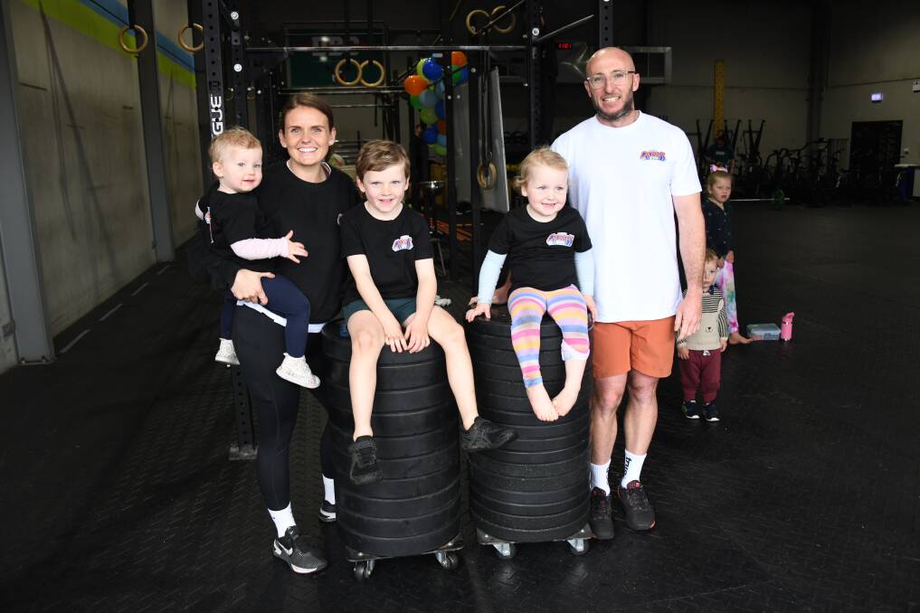 Dubbo CrossFit owners Katelyn and Thomas Wilson with kids Macey, Ollie and Adie. Picture by Amy McIntyre