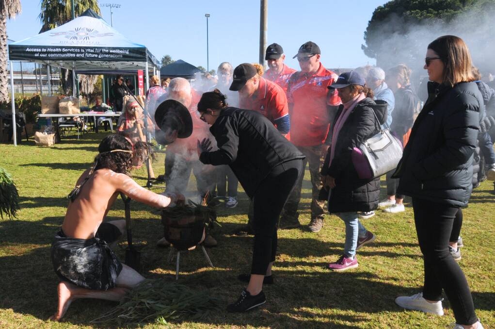 The Sorry Day commemoration in Dubbo opened with a smoking ceremony. Picture by Allison Hore