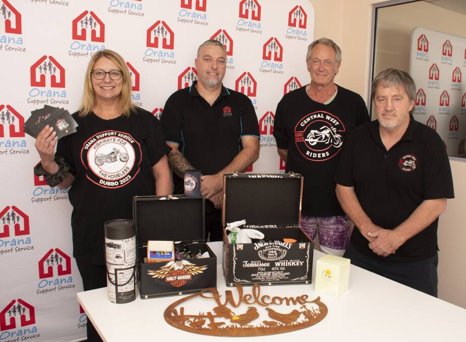 Georgie-Anne Pomfret and Paul Taylor from Orana Support Services with Wayne Collins and Darrel Harvey from Central West Riders. Picture by Belinda Soole