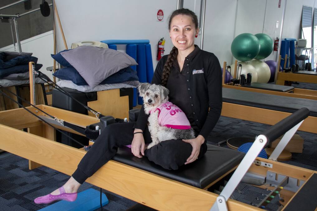 Owner of Pilates Exclusive Melanie Trapman and her dog Jasmine. Picture: Belinda Soole