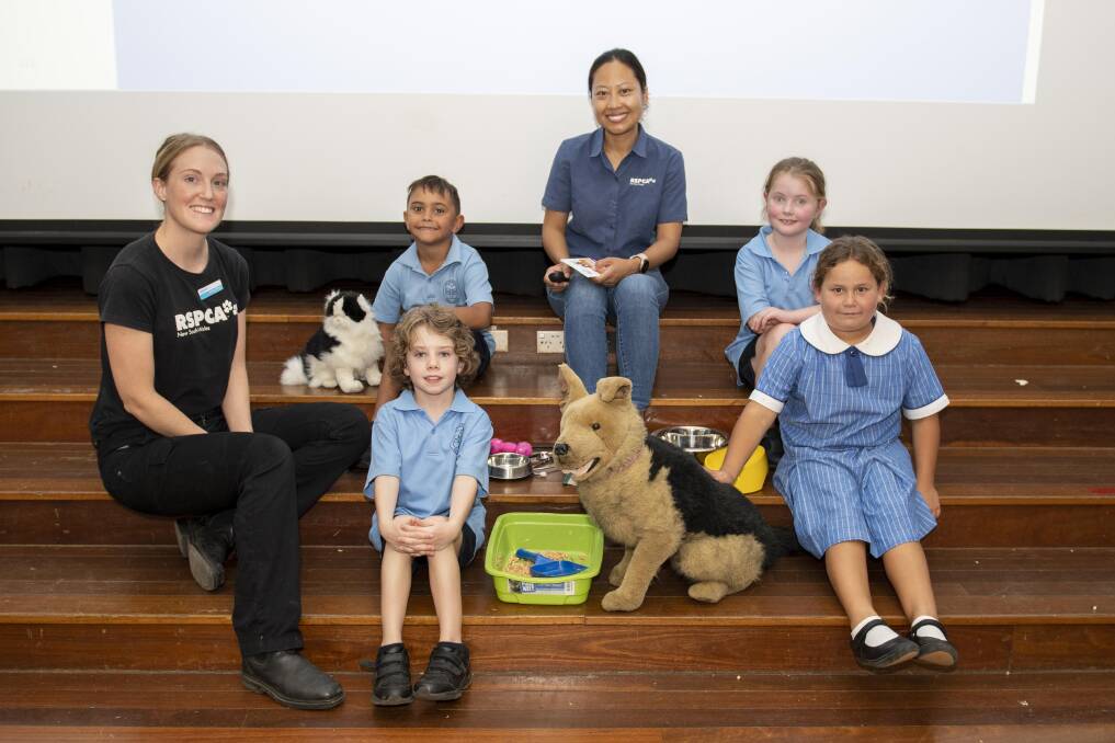 Senior education officer at the RSPCA Stephanie Sok (centre) with students from Bunniyong Public School. Picture by Belinda Soole