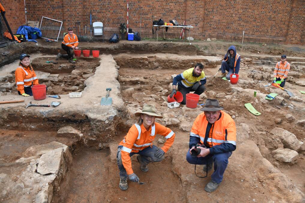 Jodie Benton and Ben Churcher with the OzArk team at the dig site out the front of the Old Dubbo Gaol. Picture by Amy McIntyre