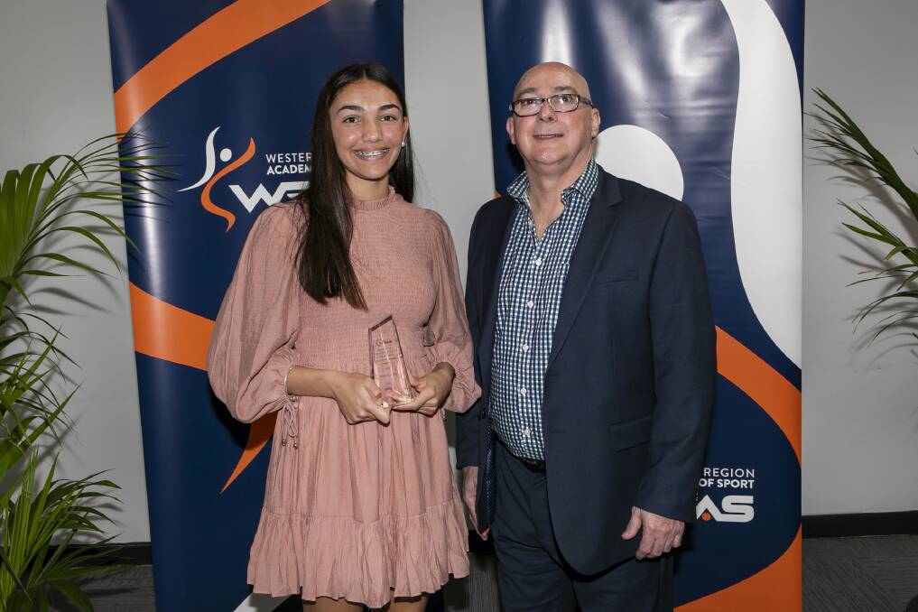 OA by ATSI athlete award winner Millie Sutcliffe - from Dubbo - with UAA representative Keith Palmer. Picture: Supplied