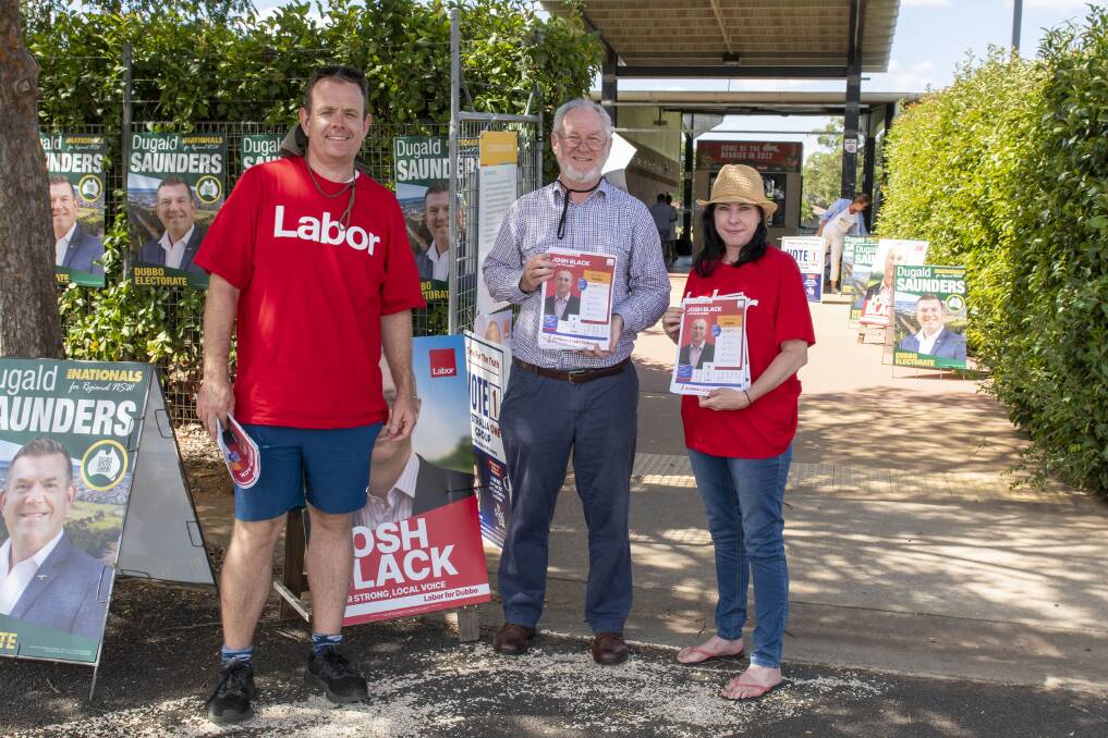 Newly elected upper house member Stephen Lawrence canvases at the Apex Oval pre-poll with other Labor supporters. Picture by Belinda Soole