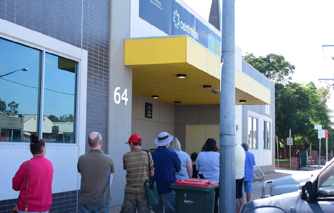 People line up at the Centrelink office on Wingewarra Street in Dubbo. Picture from file