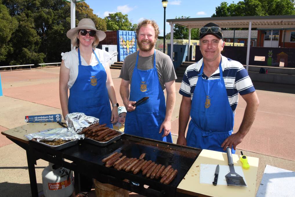 Liz Skinner, Ross McDonald and William Chapman fry up a feast at the Dubbo South Public School polling booth. Picture by Amy McIntyre