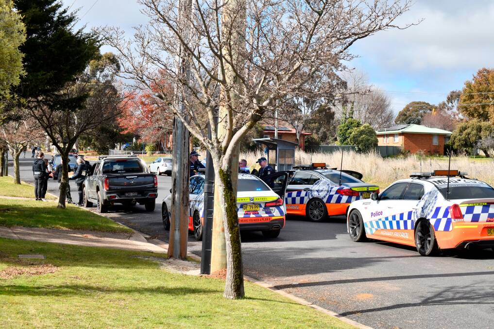 Dramatic scenes on Kurim Avenue in Orange on Thursday morning, where a man was arrested after a slew of carjackings. Picture by Carla Freedman. 