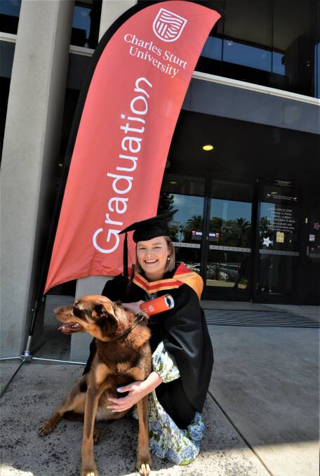 Among Isobel Cahill's graduation guests is her pet Willow. Picture by Elizabeth Frias