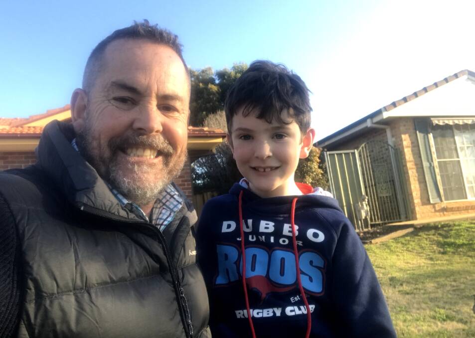 Retired Australian Defence Force officer, Shaun Graham, with his son, William. Picture Supplied