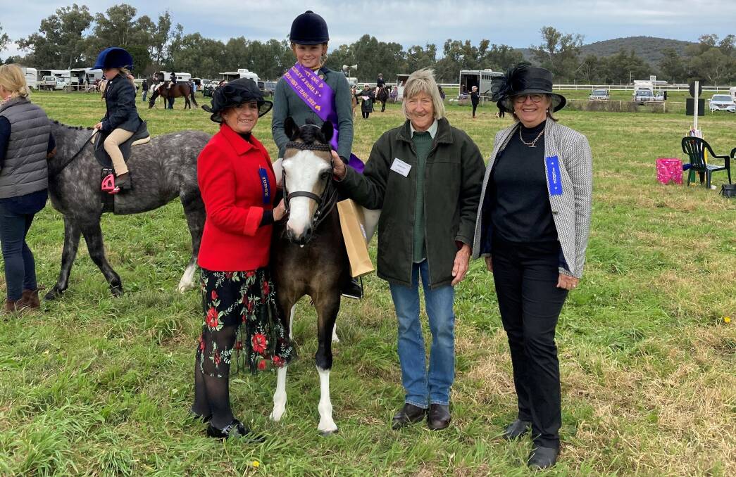 The 2022 Wellington Show's Supreme Champion Local Rider under 17 years was Kiah Bennett, with trophy sponsor Jan Wightley and judges. Picture supplied
