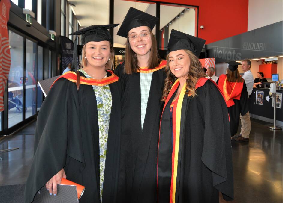 Charles Sturt University's pandemic nursing students graduating with flying colours from right, Katherine O'Brien, Lucy Darney and Isobel Cahill. Picture by Elizabeth Frias