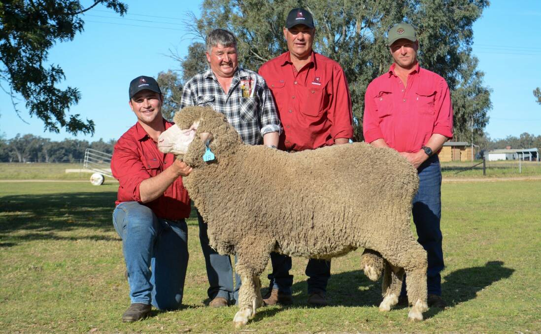 Mitch Rubie, Lachlan Merinos, Mark Jones, Condobolin, Glen Rubie, Lachlan Merinos and Brad Jones, Condobolin with Lachlan 221039, which sold for $7000. Picture by Elka Devney