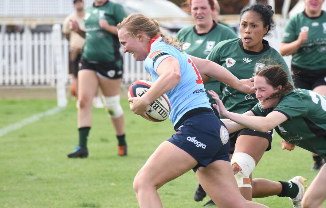 Danielle Plummer heads for the try line for the Dubbo Kangaroos in a match against Orange Emus at Victoria Park. Picture by Amy McIntyre