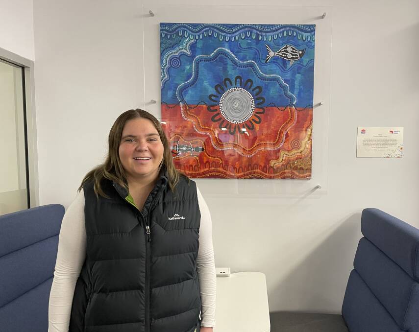 Wellington Artist Shakyla Toomey standing in front of her painting titled 'Home'. Picture by Ciara Bastow 