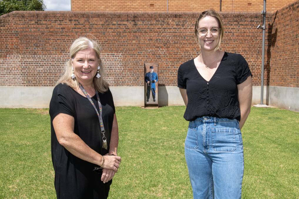 Julie Webster and Kate O'Shaughnessy stand on the grass at the Old Dubbo Gaol. Picture by Belinda Soole 