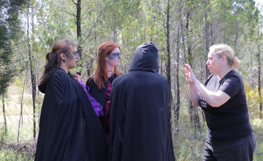 Erifili Davis (far right) directs Dubbo actors (from left to right) Kalina Davis,
Milla Ross and Georgie Saunders on the location of the short film 'Fell Purpose'. Picture by Jude Morrell.