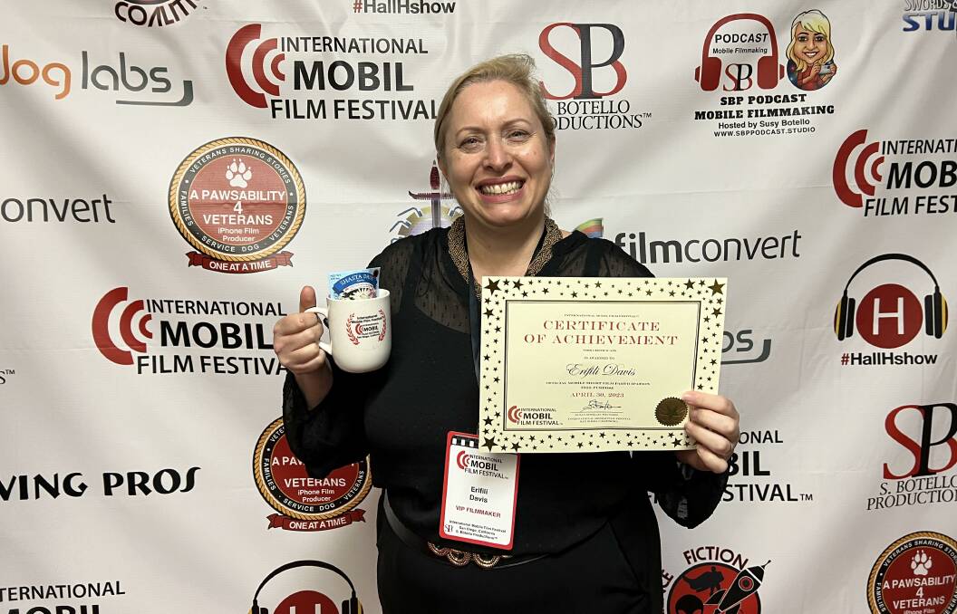 Erifili Davis at the International Mobile Film Festival holding a certificate of achievement. Picture supplied 