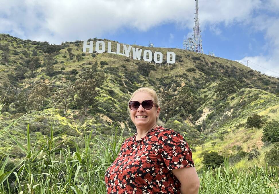 Filmmaker Erifili Davis at the Hollywood sign in America. Picture supplied 