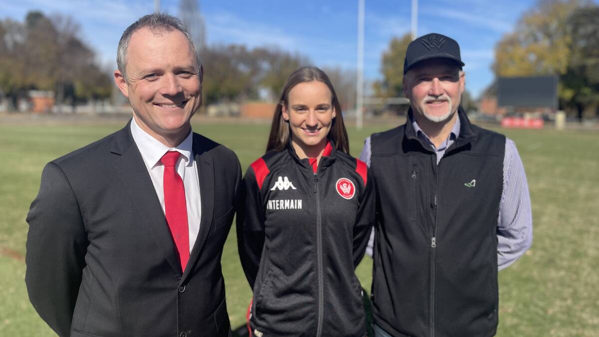 Western Sydney Wanderers CEO Scott Hudson, Wanderers women's footballer and Bathurst native Cushla Rue and Bathurst councillor Ian North at Carrington Park in June. Picture by Bradley Jurd