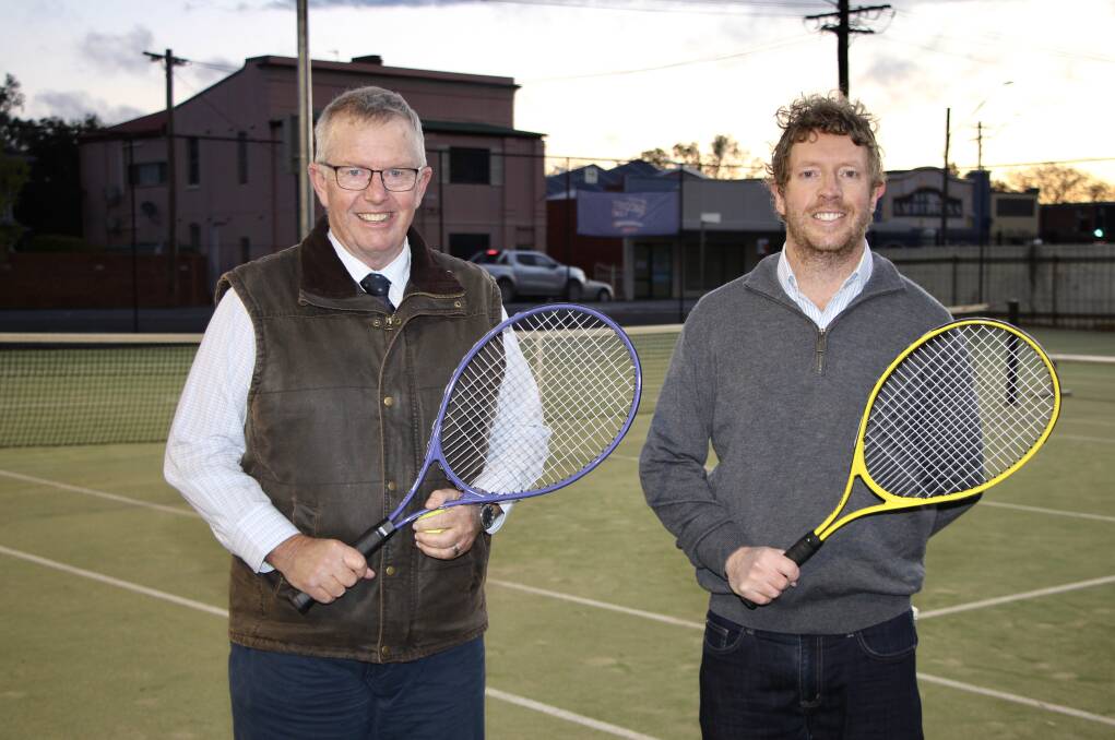 LIGHT UP: Federal Member for Parkes Mark Coulton with Paramount Tennis Club President Charlie Whiteley at the clubs newly-lit tennis courts this evening. Photo: CONTRIBUTED