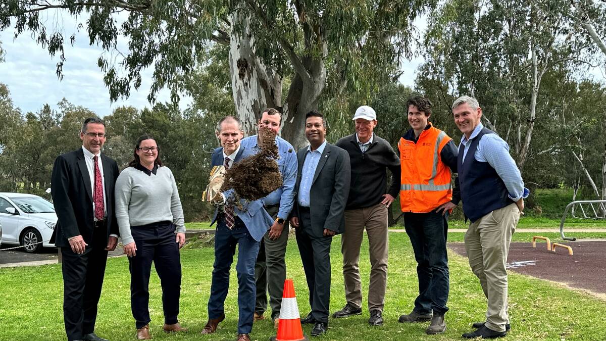 Dubbo Mayor Mathew Dickerson (third left) stands with other officials as he digs the first bit of soil for the Legacy Pathway to be built along the Macquarie River, Dubbo. Picture supplied
