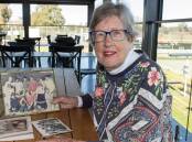 Ros Walters with some old family photographs. Picture by Belinda Soole