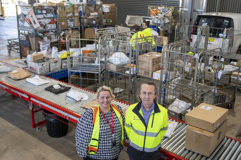 Kristina Jorgenson Regional Area Manager with John Bold Territory West Manager at the new Australia Post parcel centre in Dubbo. Picture by Belinda Soole