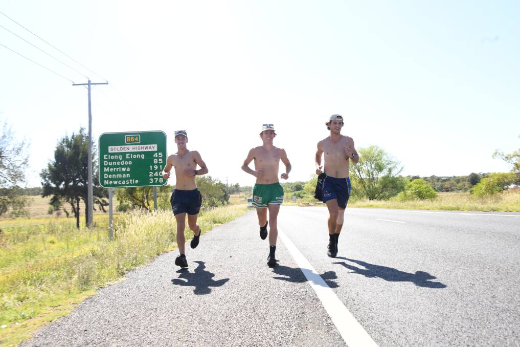 Matt Bridges, Connor Etcell and Cameron Longhurst took a week off work to run from Newcastle to Dubbo, and raised over $13,000 for the Black Dog Foundation. Picture by Amy McIntyre