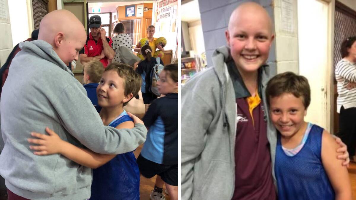 Molly Croft (grey hoody) and Mia Richardson in May 2019 when Molly returned to Dubbo after her initial treatment for sarcoma, and Mia had short hair from her first shave. Pictures supplied