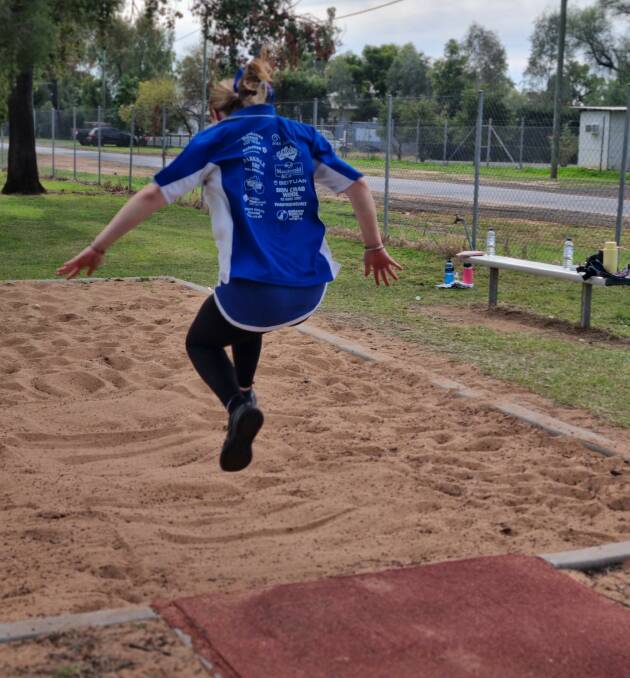 A teenager at Gilgandra High School competes in the long jump. Picture supplied