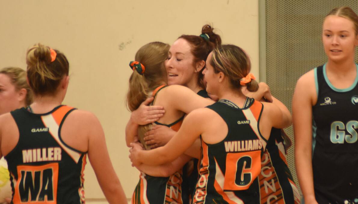 Tegan Dray embraced by her Orange City teammates after the win. Picture by Riley Krause