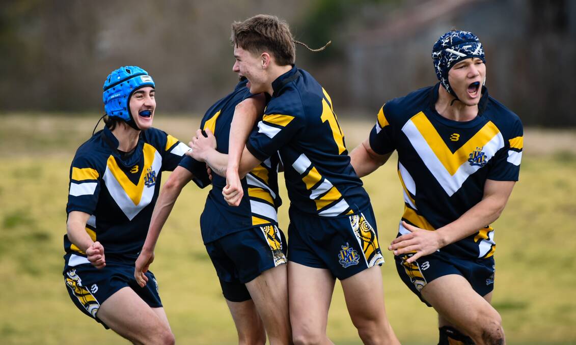 Bathurst High School players celebrate a try during the first half of their game against Dubbo Senior College. Picture by James Arrow
