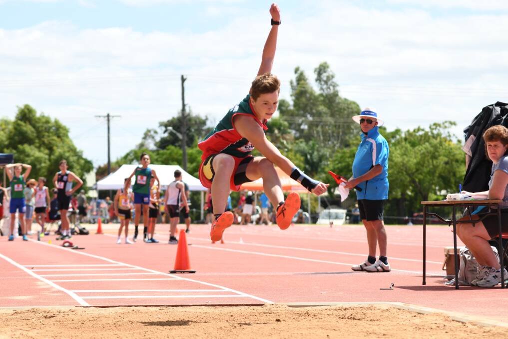 HELPING OUT: Plenty of volunteers were needed at Barden Park on the weekend to allow athletes like Kurrajong's Alex Sinnett to soar. Picture: Amy McIntyre