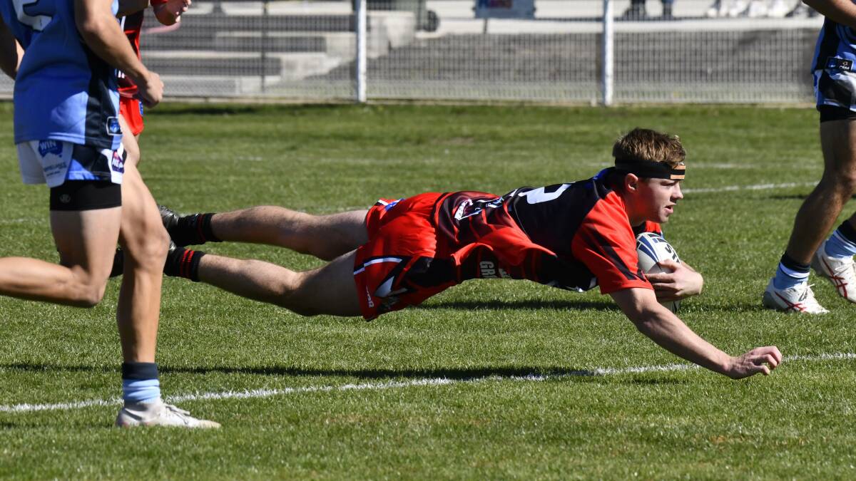 Dane Richards goes in to score for the Group 11 representative side at Blayney earlier this year. Picture by Jude Keogh