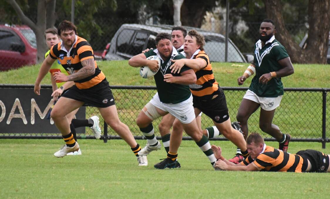 Western's Josh Merritt attempts to break through the Northern Tigers' defence at Narromine earlier this month. Picture by Nick Guthrie
