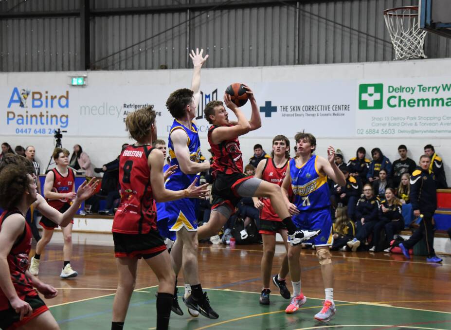 Kane MacFarlane showcases his athleticism while getting a shot away for Dubbo. Picture by Nick Guthrie