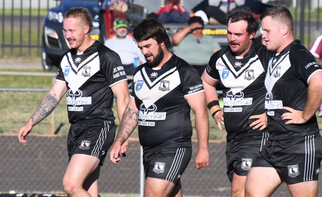 Tom Toohey (far left) was all smiles after one of Forbes' tries at Wellington on Sunday. Picture by Nick Guthrie