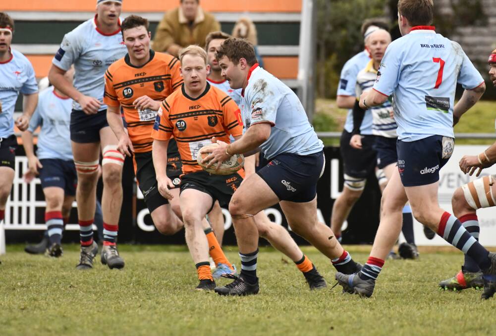 Will Anderson takes the ball forward during the Roos' tough contest with Orange City on Saturday. Picture by Jude Keogh