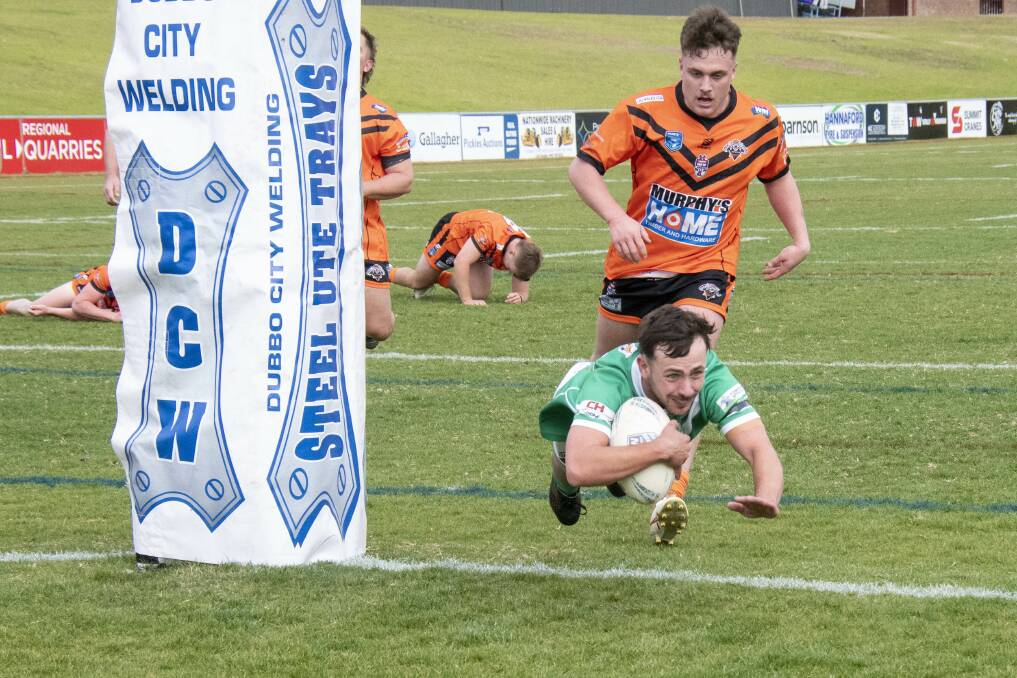 Sully Haycock dives over to score during the second half of CYMS' big win on Sunday. Picture by Belinda Soole