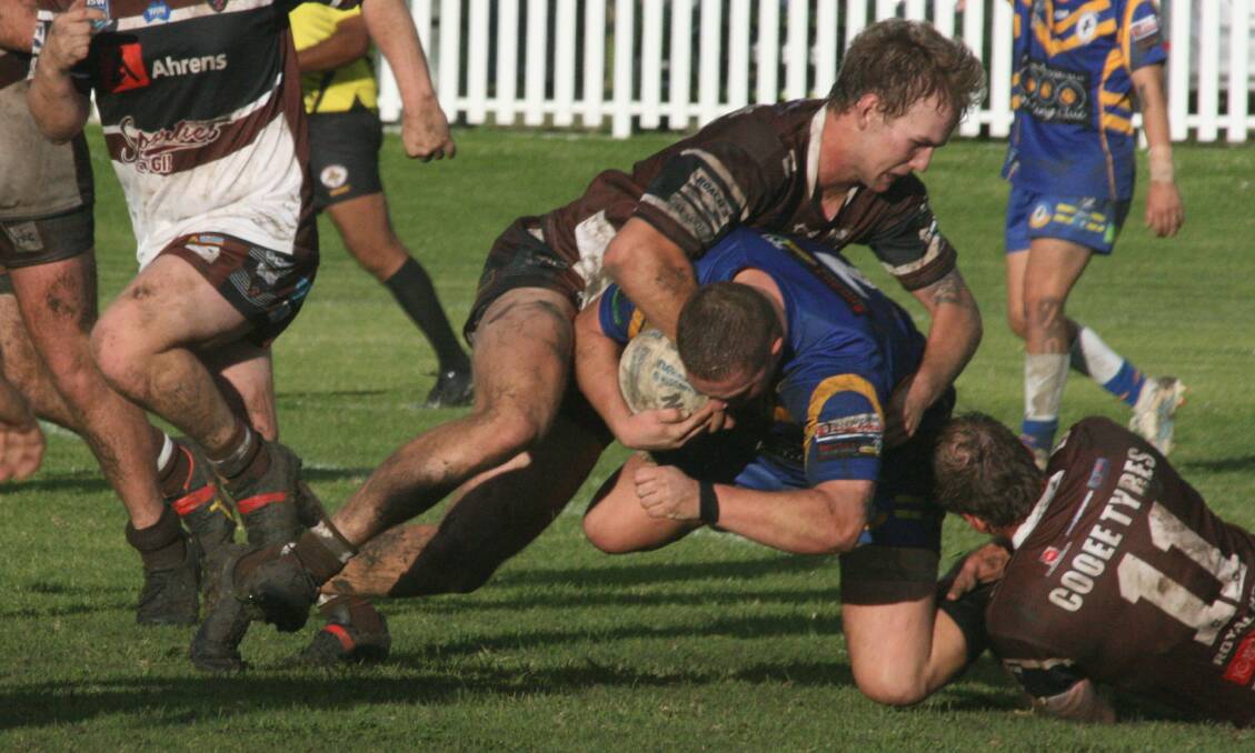 The Gilgandra defence working to stop the Coonabarabran Unicorns in round six of the 2024 season. Picture by Stephen Basham