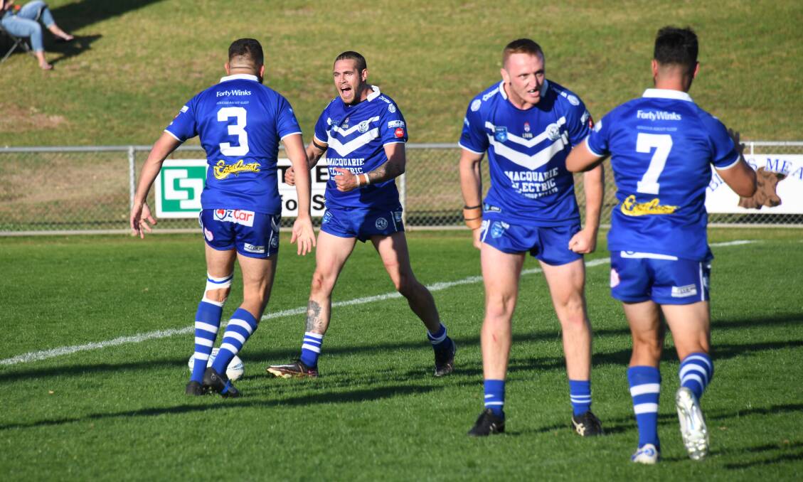 A try for Josh Nixon (second from left) got Macquarie back within two points of Mudgee on Sunday but that was as close as they got. Picture by Amy McIntyre